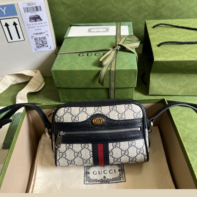 G*u*i clutch bags